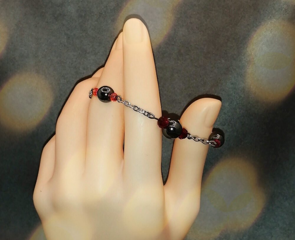 bracelet en pierres hématites et chaîne en acier