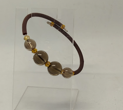 bracelet pierres quartz noir fumé Bracelet élégant en pierres naturelles de quartz noir fumé, alliant raffinement et style, parfait pour sublimer toutes vos tenues.