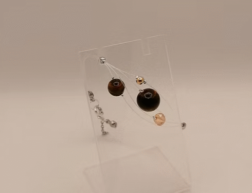 bracelet en pierres œil de tigre sur fil de bijou transparent