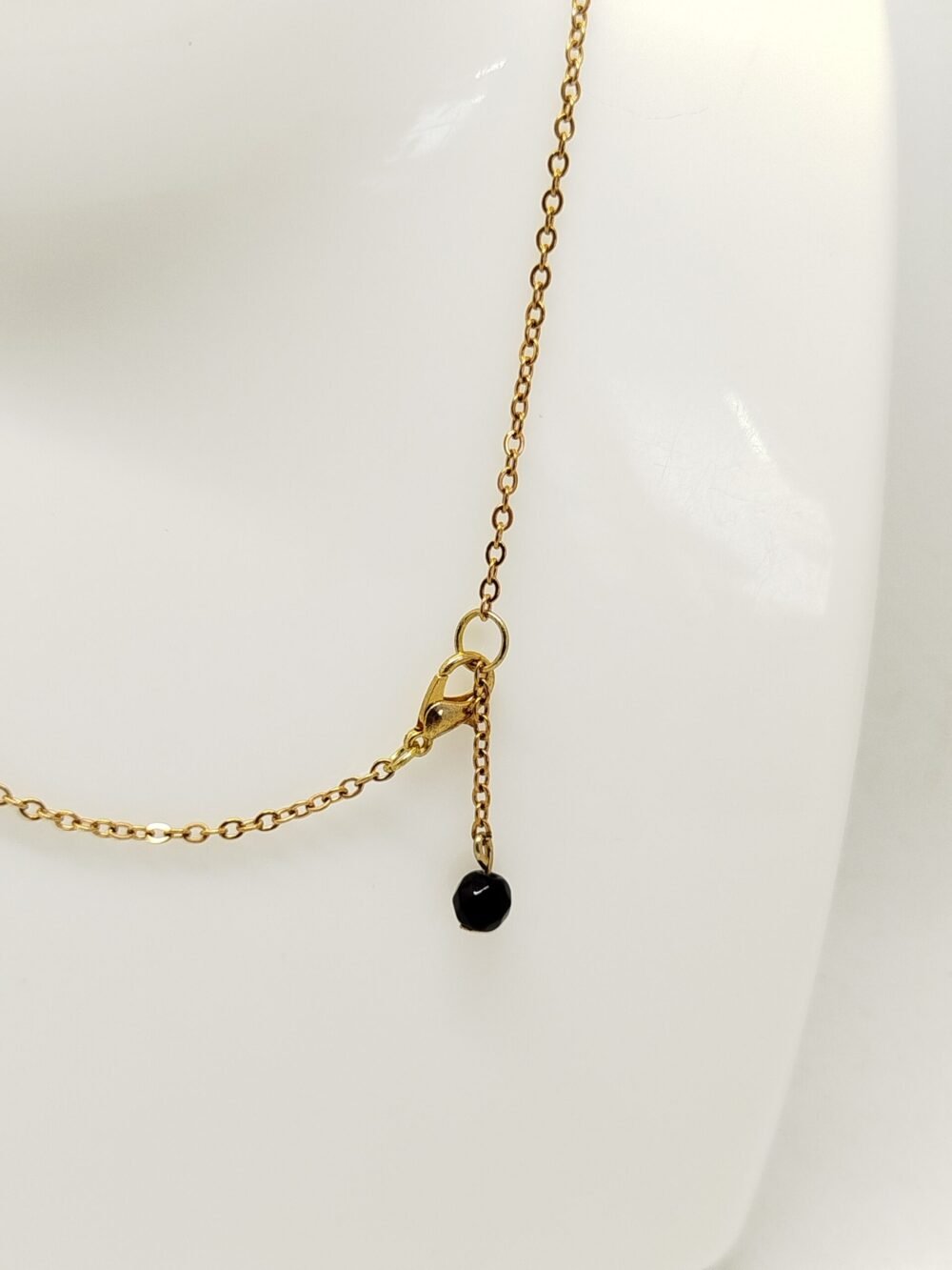 collier en acier doré fermoir mousqueton et ralonge