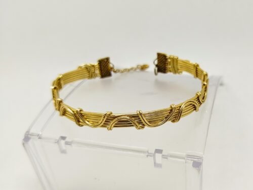 Magnifique bracelet doré au décor vagues, Magnifique bracelet doré au décor vagues,